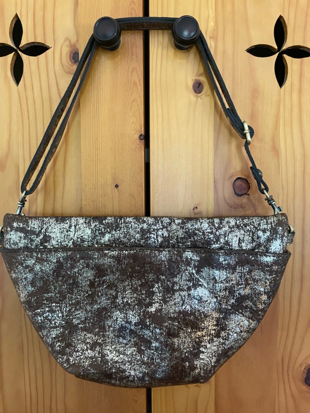 Patricia Nash Tinchi belt bag brown and gold design.